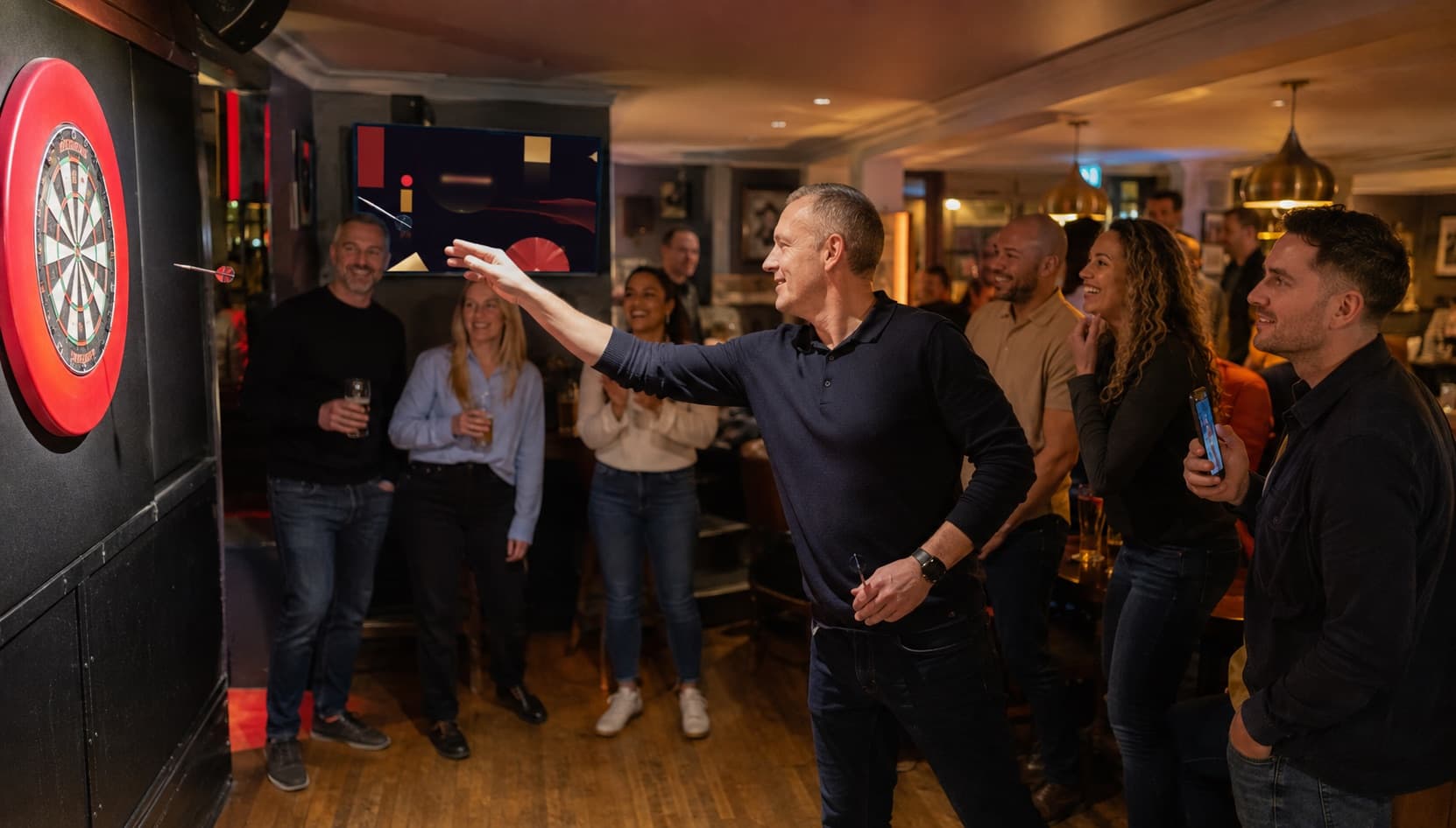 A lively pub group enjoying a friendly Killer Darts night